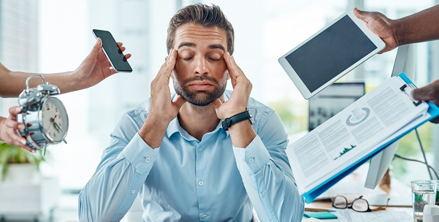 Stressed Man Illustrating the Connection Between Stress and Blood Pressure