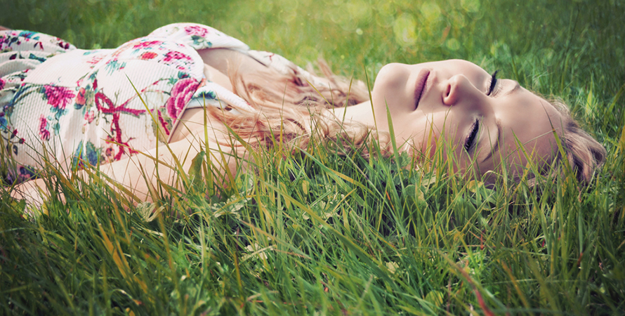 portrait-young-blonde-woman-lying