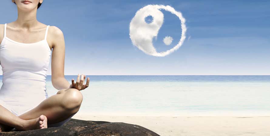 Close woman exercise yoga beach ying